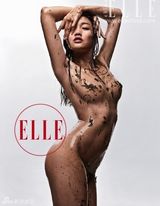 幻灯图：余男环保大片全裸出镜 似婴儿蜷卧母亲腹中