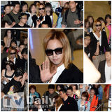 组图：张根硕赴日亮相机场 黄发墨镜白指甲另类