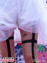 组图：王心凌穿白色薄纱裙演绎丝袜诱惑