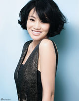 组图：闫妮登杂志封面显优雅 谈笑间展露风情