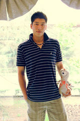 组图：孙敬媛深V秀S身形 与男排队长拍奥运写真