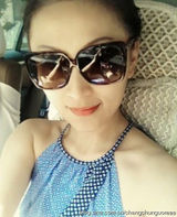 组图：杨子漂亮老婆私房美照皮肤白皙