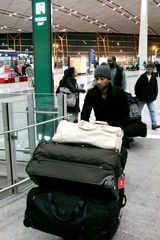 组图：John Legend携女友抵京 与李玟备战不亦乐乎