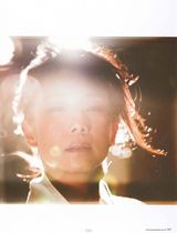 组图：林忆莲潜水拍唯美写真 低胸裙湿身晒事业线