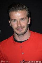 高清图：贝克汉姆为品牌站台 橘红色T恤抢眼