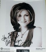 组图：安妮斯顿与未婚夫童年照明星范儿十足