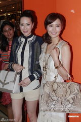 组图：汪诗诗出席新店开幕礼 力挺甄子丹认真专业