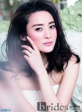 组图：蒋勤勤再拍婚纱写真 甜蜜依偎陈建斌