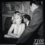 组图：梦露赴派对旧照首曝光 身穿经典露背礼服