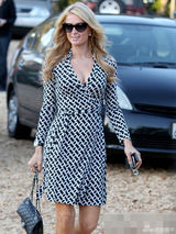 组图：希尔顿飞机场变丰满 俯身挤乳沟挑南瓜