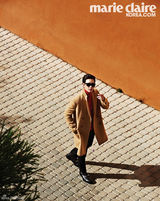 组图：金秀贤异域写真 红墙蓝天下的外星男