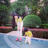 组图：美女硕士毕业抱儿子怀女儿被赞人生赢家