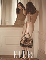 组图：韩星申敏儿优雅写真 散发慵懒成熟美