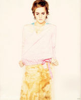 组图： 艾玛登《Elle》封面 可爱表情展小女人风情