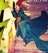 组图：蕾哈娜裹身上阵演绎地道阿拉伯风情