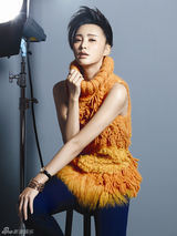 组图：张歆艺短发率性登封面 展爽朗无拘个性