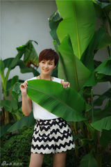 组图：戴娇倩拍自然大片 清新迷人语笑嫣然