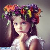 组图：大眼萝莉姐妹走红 写真妈妈掌镜精致如画