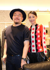 组图：白百何亮相品牌活动 波点红装俏皮抢镜