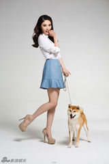 组图：徐冬冬登宠物杂志封面 拥抱爱宠温馨幸福