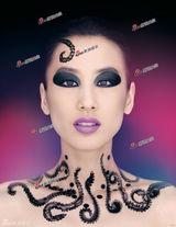 组图：黄圣依新造型大胆 面部图腾浓艳魅惑