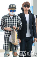 组图：SHINee等亮相机场 全副武装走神秘路线