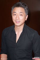 组图：廖启智坦言为牌照事件心情尴尬不平衡