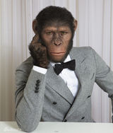 组图：“猩球”凯撒穿西装帅气过人 被求生猴子