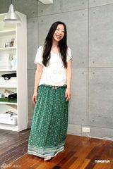 幻灯组图：万芳五年后发新专辑 着绿色长裙春意盎然