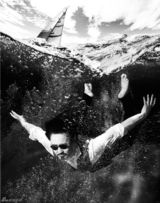 组图：吴秀波曝封面大片 正装潜水大玩湿身诱惑