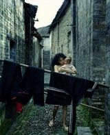 组图：张曼玉16年前半裸拍写真尺度大