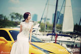 组图：韩星尹世雅拍婚纱写真展极致优雅