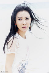 组图：石天琦夏日度假写真 阳光笑容邻家装扮