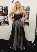 组图：小贝长子力挺绯闻女友 齐现身新片首映