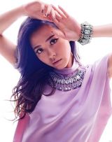 组图：张靓颖登杂志9月刊封面 尝试百变造型