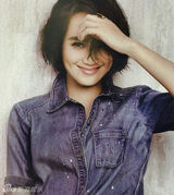 组图：朱丹时尚写真扮西部女郎尽显优雅风