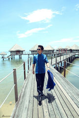 组图：张晓龙炫酷写真 “温太医”变脸沙滩型男