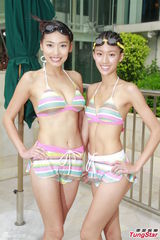 组图：港姐佳丽首度泳衣亮相 水上展傲人身姿