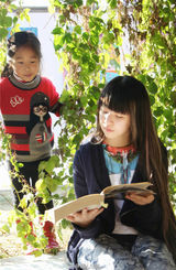 组图：小彩旗自制点心纹身特别 童年萌照可爱