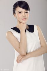 组图：张璇最新写真白裙端庄  褪去清纯变温柔熟女