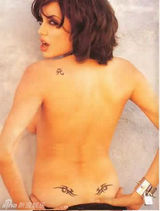 组图：朱莉25岁半裸照被拍 野马吻椒乳自在享受