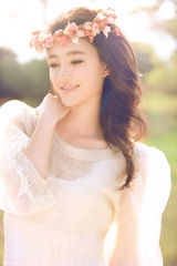 组图：花仙子王丽坤写真盛夏沁人绽放