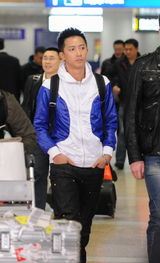 高清组图：韩庚低调秘密回京 机场“放空”