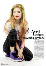 组图：艾薇儿写真彩发耀眼 称从来不是个朋克