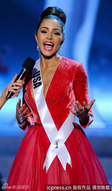 组图：奥利维娅夺环球小姐桂冠 圆润双峰隐现