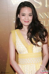 组图：舒淇澄清情伤传闻 嫩黄长裙显优雅