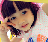 组图：钟丽缇爱女Cayla四岁生日 捧元宝甜笑