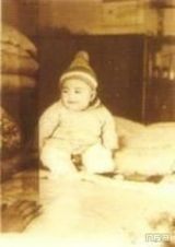 幻灯组图：王菲幼年生活照 泛黄照片现天后幸福童年