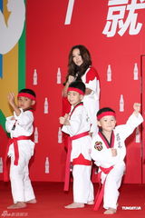 组图：张惠妹回忆练跆拳道时光为奥运加油