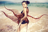 组图：张嘉倪曝性感写真沙滩化身魅惑精灵舞动